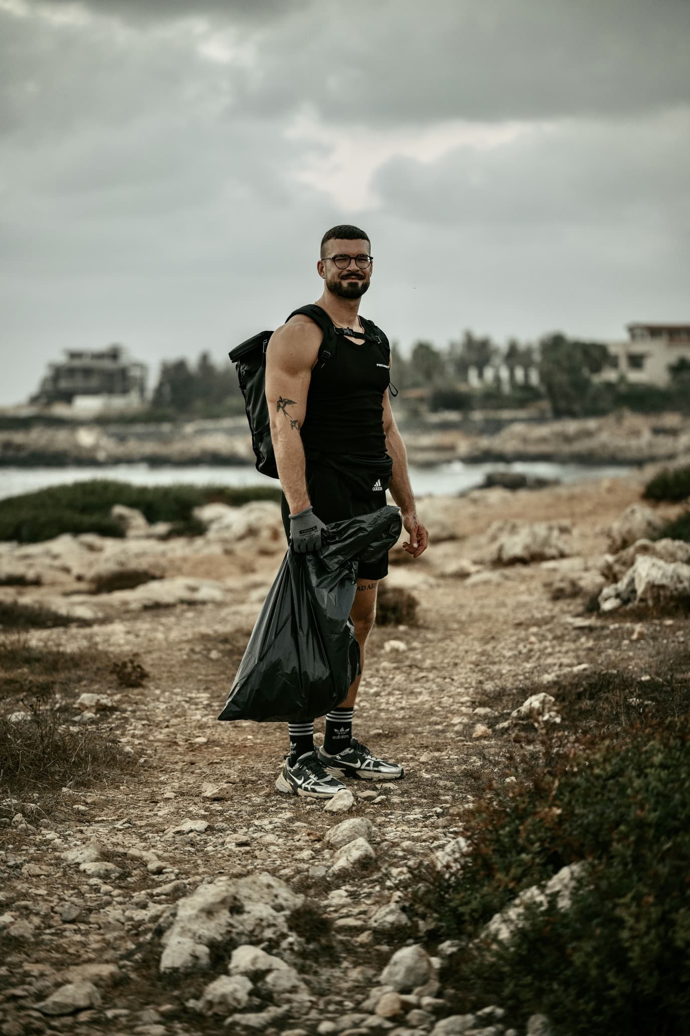 Niklas picking up litter to keep Cyprus clean